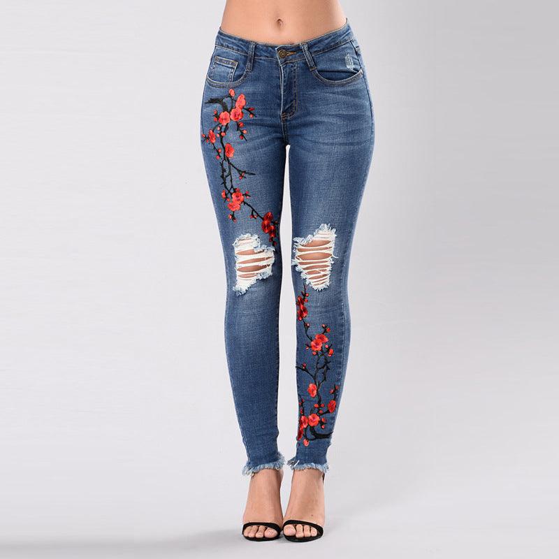 Fashion hole embroidered high-elastic denim women's trousers